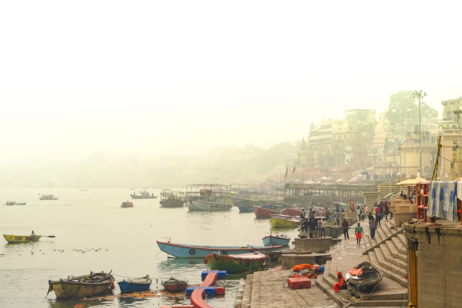 Boats and historic ghats on the banks of the Ganga in Varanasi